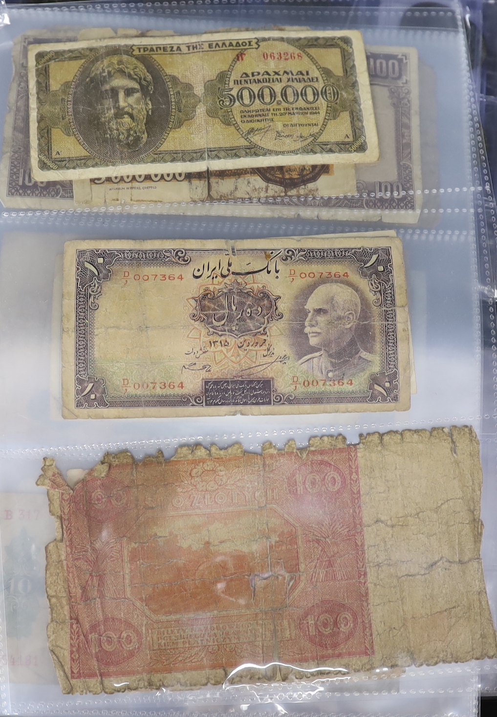 A collection of British Commonwealth and World coins together with 19th/20th century banknotes including China